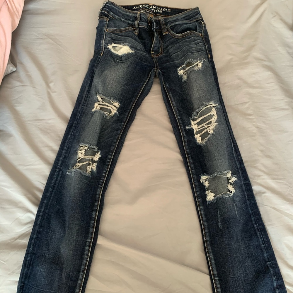 ripped blue jeans